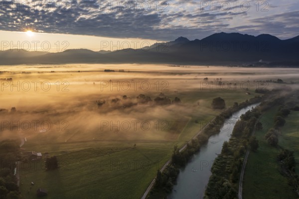 Aerial view of a river in front of mountains in the morning light, fog, autumn, Loisach, view of