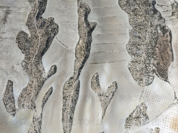 Farmland amongst rocky outcrops. Aerial view. Drone shot. Granada province, Andalusia, Spain,