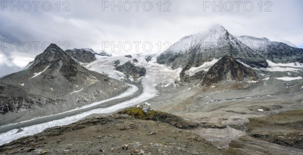 Mountain hut Cabane des Dix in front of glacier Glacier de Cheilon and summit Mont Blanc de