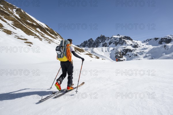 Ski tourers on the Graubünden Haute Route, Snow-covered mountains, Winter in the Albula Alps,