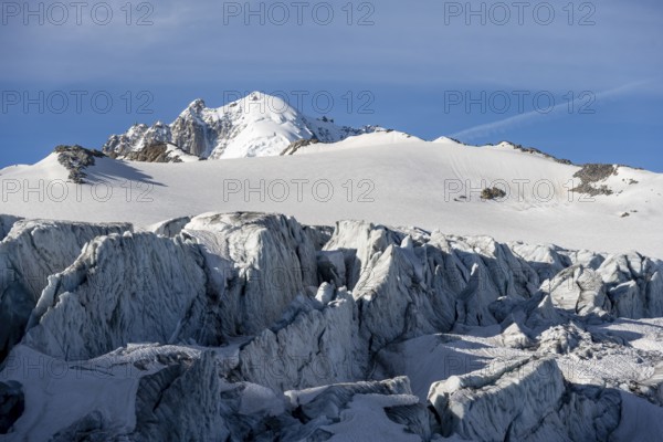Glacier ice with crevasses, Glacier du Tour, behind summit Aiguille de Chardonnet, Chamonix,
