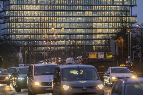 City centre traffic, Danziger Straße, B8, Düsseldorf, high-rise office building, evening traffic,