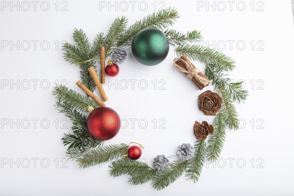Christmas or New Year wreath composition. Decorations, balls, cones, fir and spruce branches, on