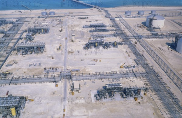 Oil industry in the Ras Tanura area, Saudi Arabia, refinery and storage tanks under construction