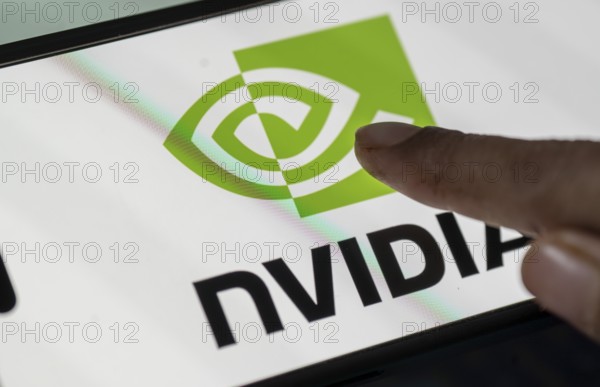 In this photo illustration, the Nvidia Corporation logo is displayed on an iPhone screen on January