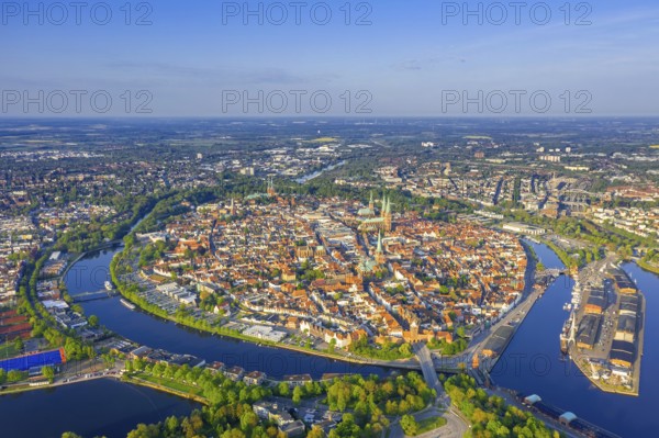 Aerial view over the river Trave and church towers in the old town of the Hanseatic City of Lübeck