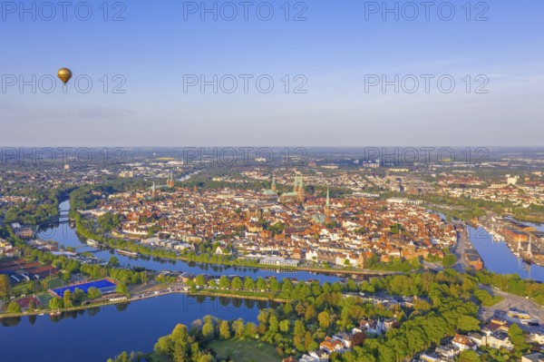 Aerial view over the river Trave and church towers in the old town of the Hanseatic City of Lübeck