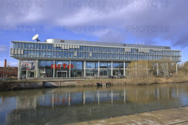 Modern building of the broadcasting station Arte of ARD and ZDF at the river Ill, bank, satellite