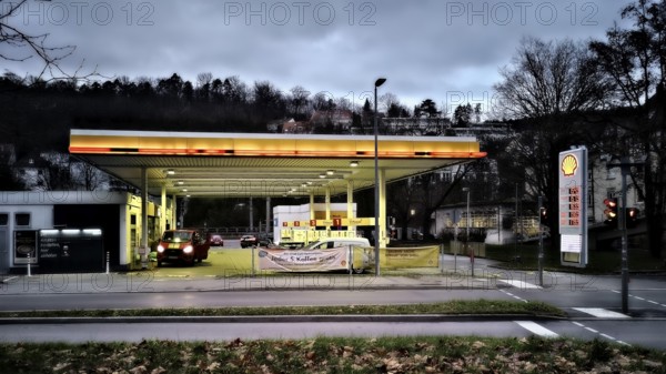 Petrol station Shell night light clouds sky dark evening atmosphere colours Stuttgart,