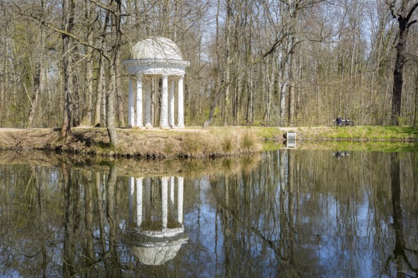Diana Temple in Lützschena Castle Park with reflection in the water, Leipzig, Saxony, Germany,