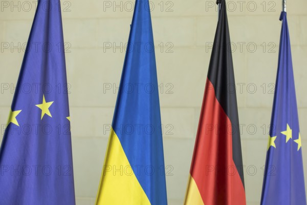 Flags of the European Union (EU), Ukraine and the Federal Republic of Germany in front of the joint