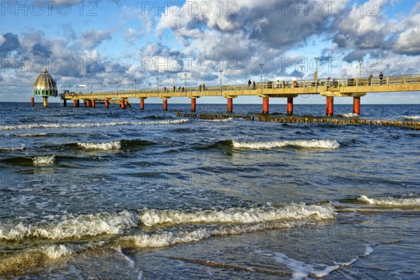 Diving gondola at the Zingst pier, cloudy mood and waves, Baltic Sea coast, Zingst,