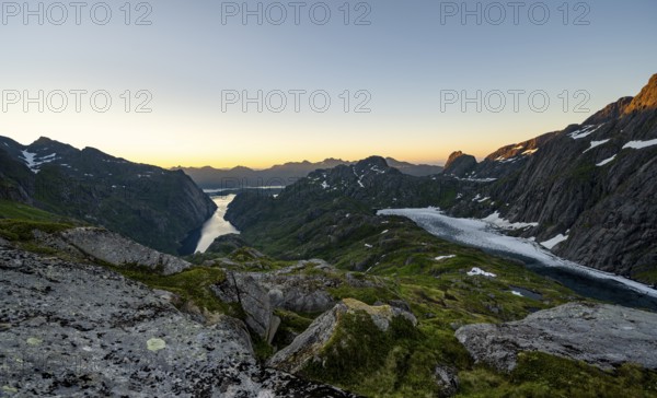 View of Engen Fjord Trollfjord at sunrise, at Trollfjord Hytta, mountain landscape with alpenglow