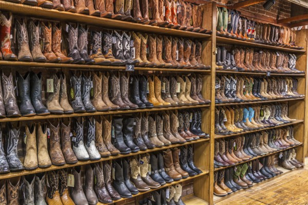 Large variety of cowboy boots for sale at boot store in downtown Nashville, Tennessee, USA, North