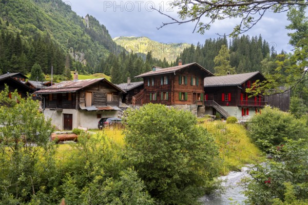 Traditional wooden houses in the mountain village of Fionnay, Val de Bagnes, Valais, Western Alps,