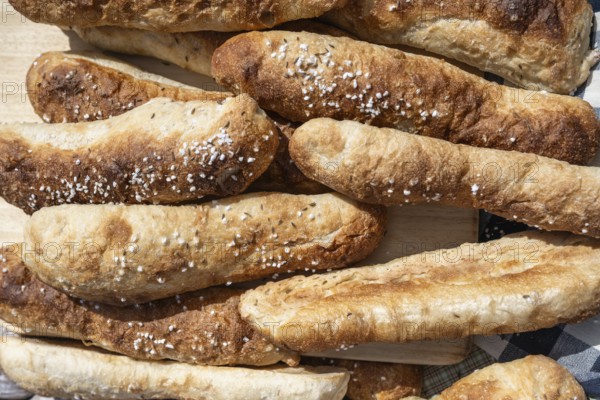 Freshly baked bread, breadsticks, souls with salt and caraway seeds, traditional pastries from