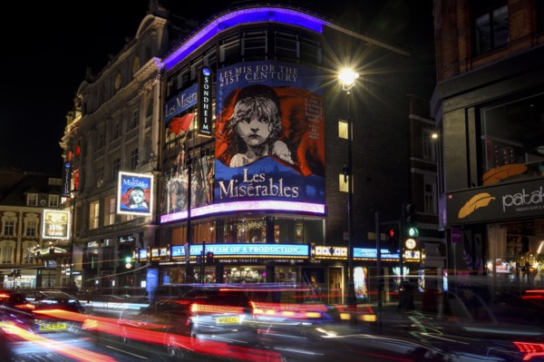 Traffic at night outside the Sondheim Theatre, Les Misérables, Musical, West End, London, England,