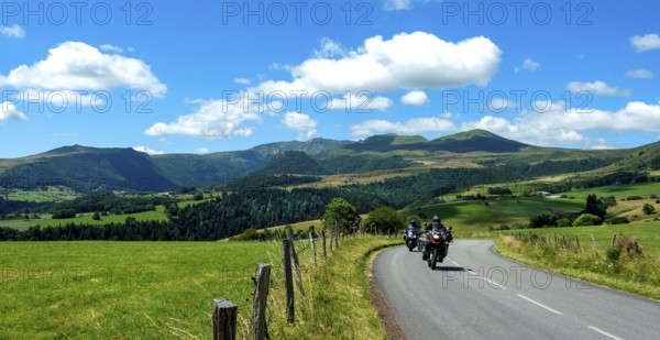 Motorcycle group in Sancy Massif. Auvergne Volcanoes Natural Park. Puy de Dome department. Auvergne