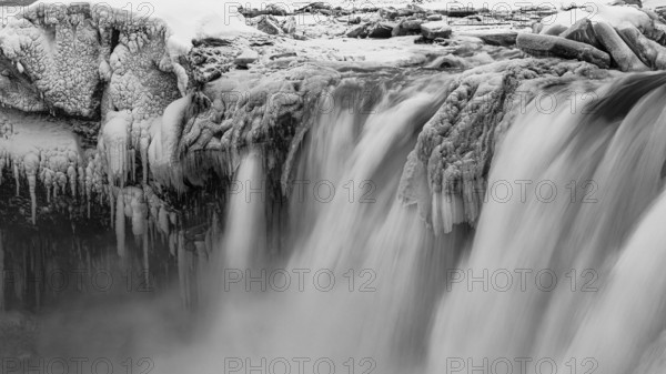 Godafoss waterfall, icy and snowy rock face, black and white photo, Northern Iceland Eyestra,