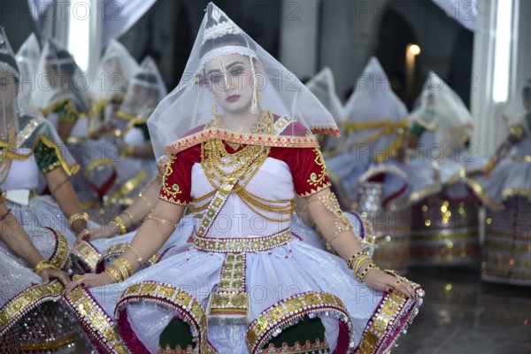 Artistes enacting the role of Gopi as they perform Manipuri Raas Leela Dance in Imphal, Manipur,