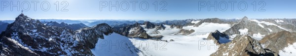 Panorama at the summit of the Wilder Freiger with summit cross and with glacier Übeltalferner and