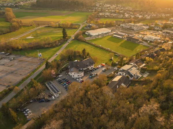 Panorama of a rural cityscape at sunset with extensive fields, Europäischer Hof, Königsbach,