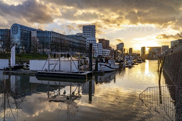 Gehry buildings - Neuer Zollhof at the Media Harbour in Düsseldorf at sunset, North