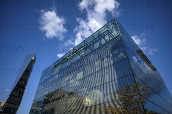 Sculpture made of glass and polylite by Carsten Nicolai behind art museum, Cube, Spiegelung,