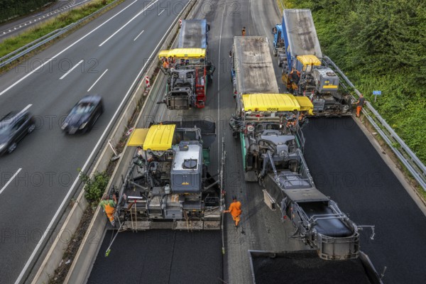 Essen, North Rhine-Westphalia, Germany, Road construction, Asphalt pavers and road rollers lay new,
