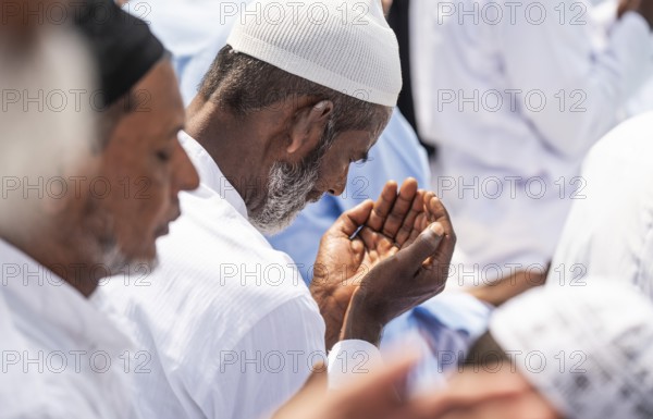 KAYAKUCHI, INDIA - MARCH 31: Muslims perform Eid al-Fitr prayer at Eidgah in Kayakuchi, India on