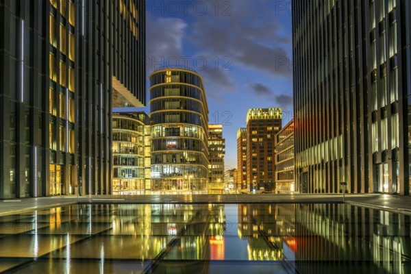 Modern high-rise architecture in the Media Harbour quarter in Düsseldorf at dusk, North