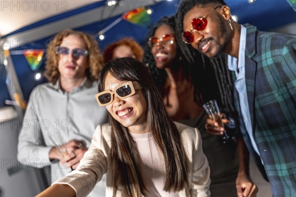 Chinese woman with elegant clothes and sunglasses taking selfie while enjoying night party with