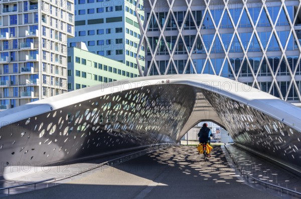The Parkbruk, cycle and pedestrian bridge in the city centre of Antwerp, crosses a multi-lane city