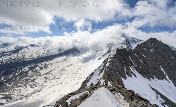 View of snow-covered mountain landscape with glaciated summit Großer Möseler and glacier