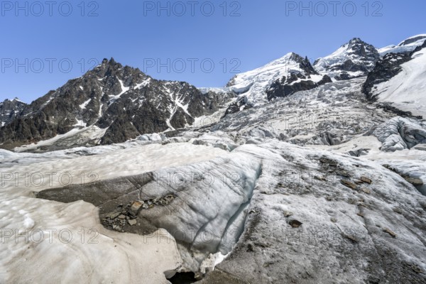 High alpine glaciated mountain landscape, La Jonction, Glacier des Bossons meets Glacier de