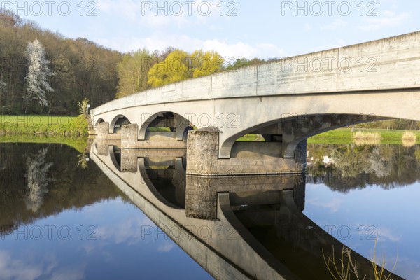 Arched bridge over the Freiberger Mulde with reflection in the water, Westewitz, district of