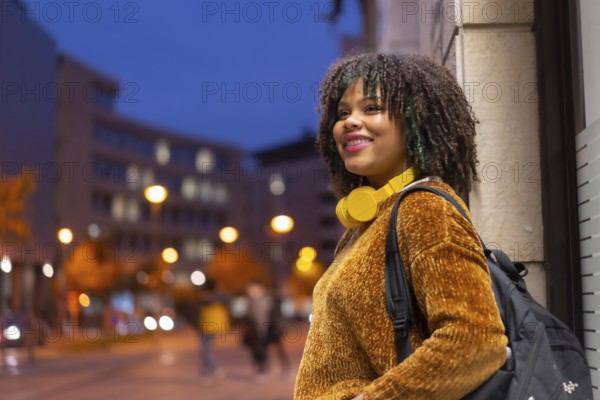 Portrait of black ethnic girl in the early morning going to the university on the way back to