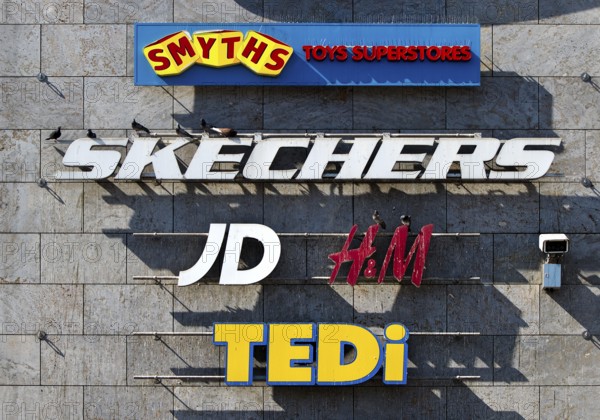 Façade of Forum Hanau with company logos at the shopping centre, Freiheitsplatz, Hanau, Hesse,