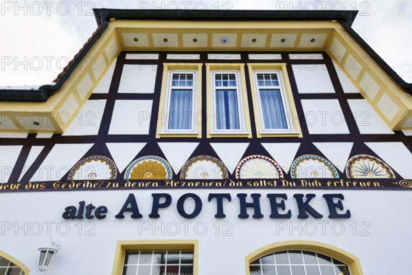 Old pharmacy, facade detail, historic headquarters of the Schierker Feuerstein brand in Schierke,