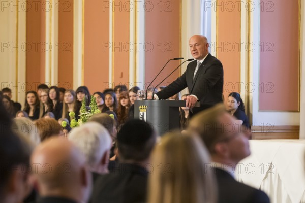 Kai Wegner, Governing Mayor of Berlin, speaks at the commemorative event organised by the Senate