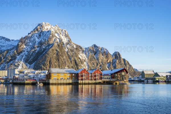 View of Svolvaer, harbour, snow-covered mountains in the background, Austvågøy, Lofoten, Norway,