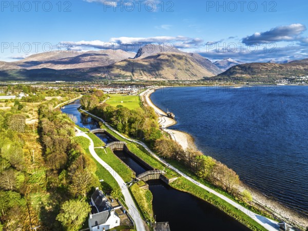 View of Caledonian Canal, Caol Beach and Nevis Range Mountains from a drone, Corpach, Fort William,