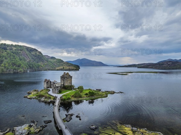 Eilean Donan Castle and Loch Duich from a drone, Isle of Skye, Highlands, Scotland, England, United