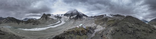 Alpine panorama, mountain hut Cabane des Dix, mountain landscape with glacier Glacier de Cheilon
