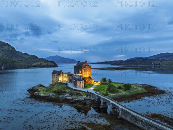 Night over Eilean Donan Castle and Loch Duich from a drone, Isle of Skye, Highlands, Scotland,