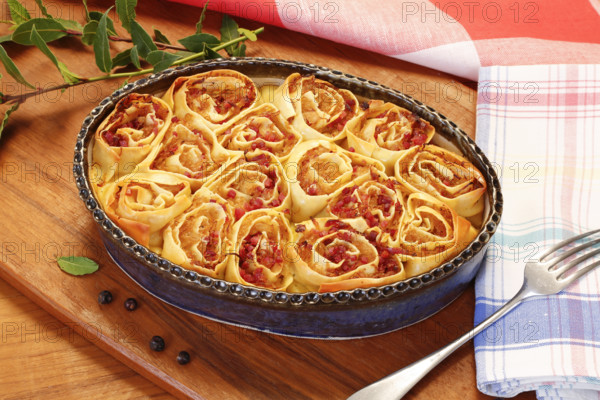 Swabian cuisine, Swabian doughnuts in a casserole dish, Swabian pasta sack, stuffed pasta pancakes