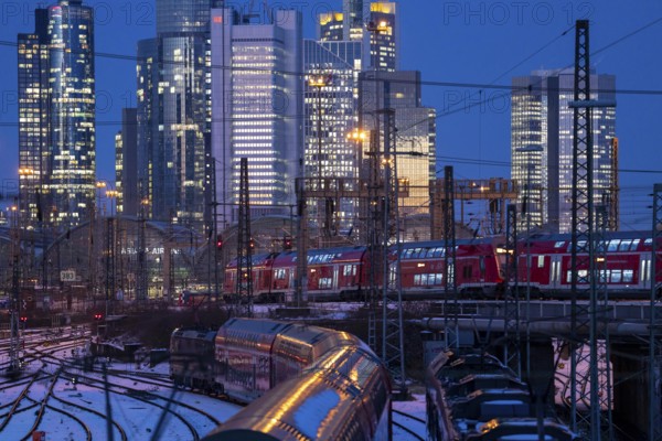 Railway tracks in front of the main railway station in Frankfurt am Main, skyline of skyscrapers in