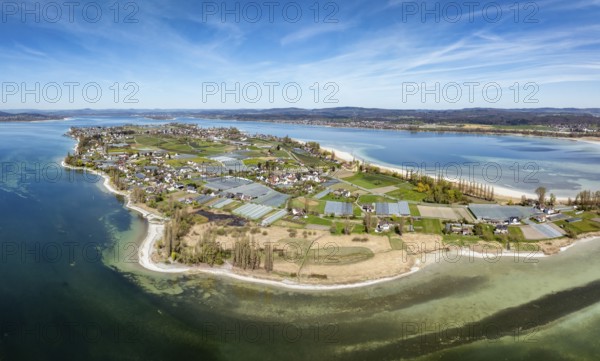 Aerial view, panorama of the island of Reichenau at low tide and spring-like vegetation, Lake