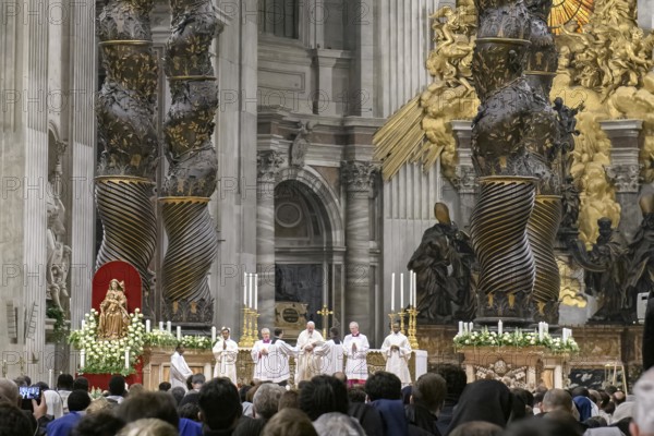 Saint Father Pope Francis prays in St Peter's Basilica under Bernini's canopy, holds Saint Mass in
