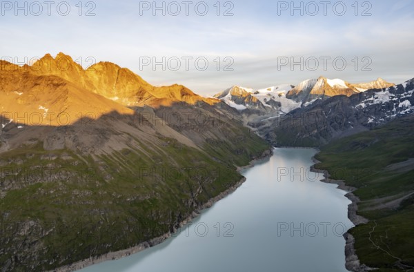 Picturesque mountain landscape at the summit Mont de la Blana at sunset, view of blue mountain
